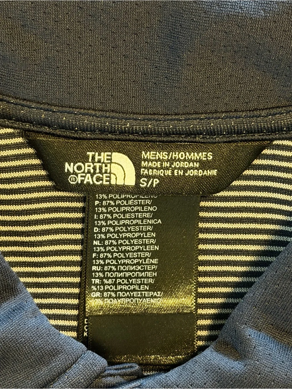 The North Face Men's Navy Polo with Red Logo